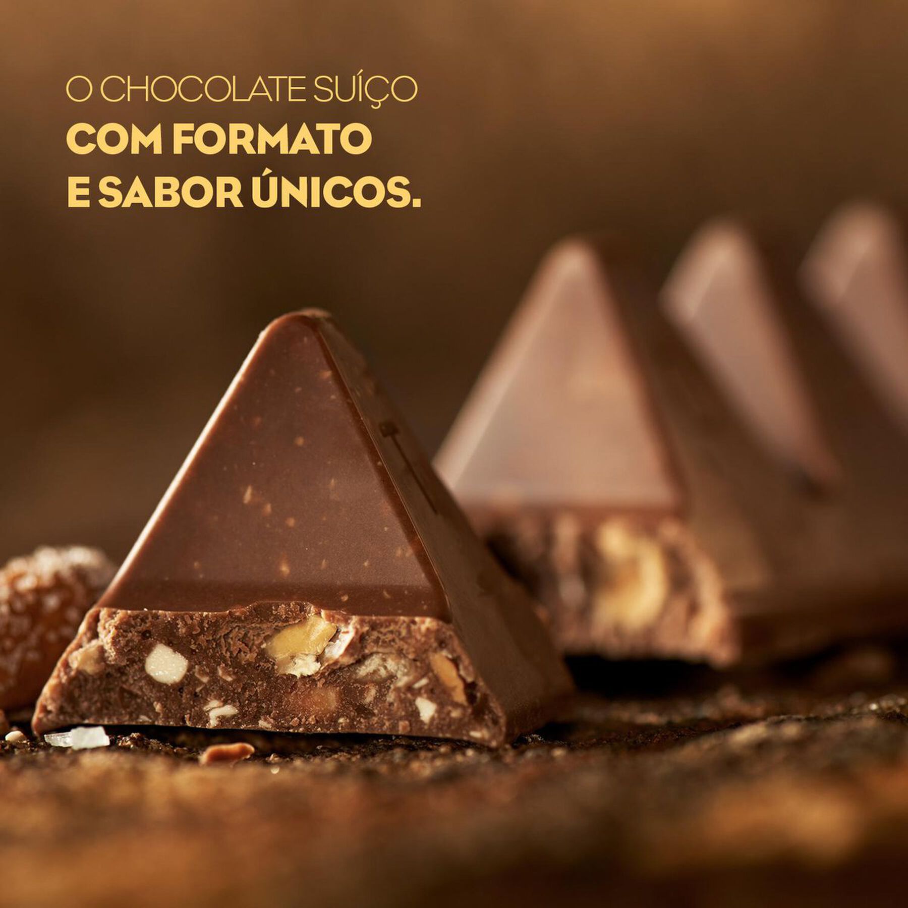 Chocolate ao Leite Nougat de Mel e Am&ecirc;ndoas Toblerone Caixa 100g